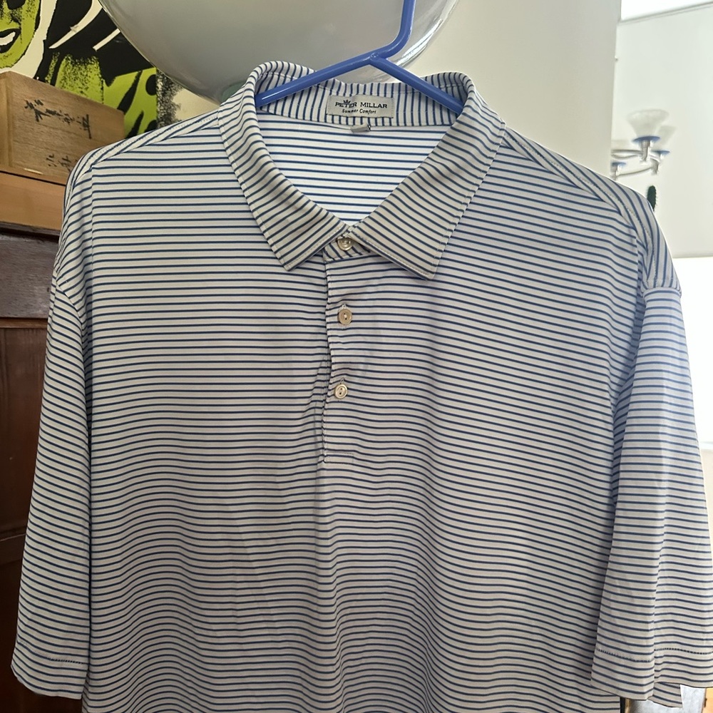 Peter Millar Blue and White Striped Polo Shirt. Buoy stripe. Three buttons.